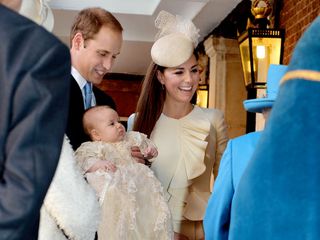 Kate Middleton and Prince William are pictured at Prince George's christening