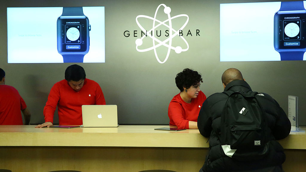 Genius Bar employees wearing red
