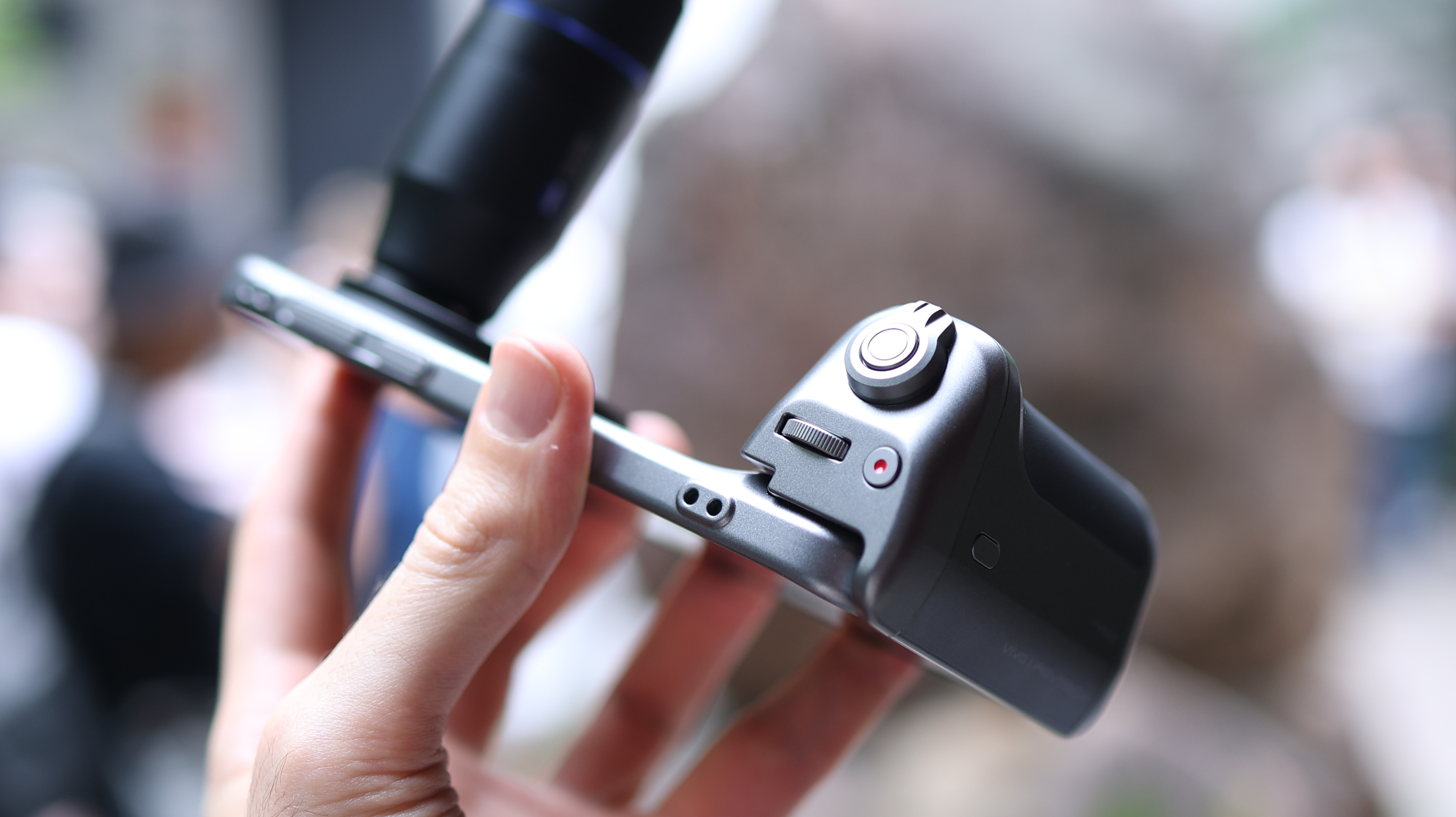 Vivo X300 Pro camera phone held in a hand
