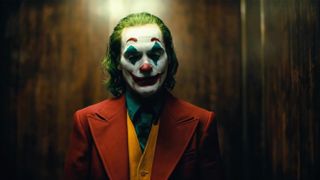 Joauqin Phoenix in clown makeup as Joker in Joker