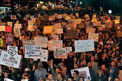 People protest Donald Trump in Denver, Colorado.