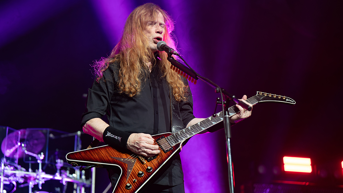  Dave Mustaine of Megadeth seen performing live on stage. Megadeth played London's O2 Arena as Special guests of the Band Disturbed on their 25th Anniversary tour Sick Things