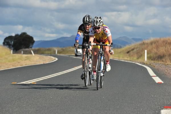 A beautiful day for racing but the elite women tail-enders had to work hard to get back on.