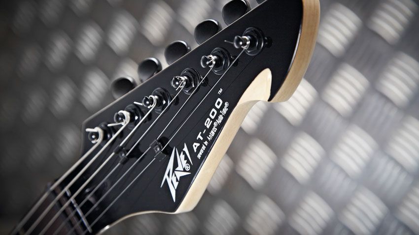 The modern six-a-side head houses adequate tuners and a couple of string trees for the top four strings