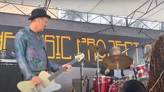 Krist Novoselic playing a Gibson bass on stage