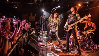 A photograph of The Struts on stage at Dingwalls