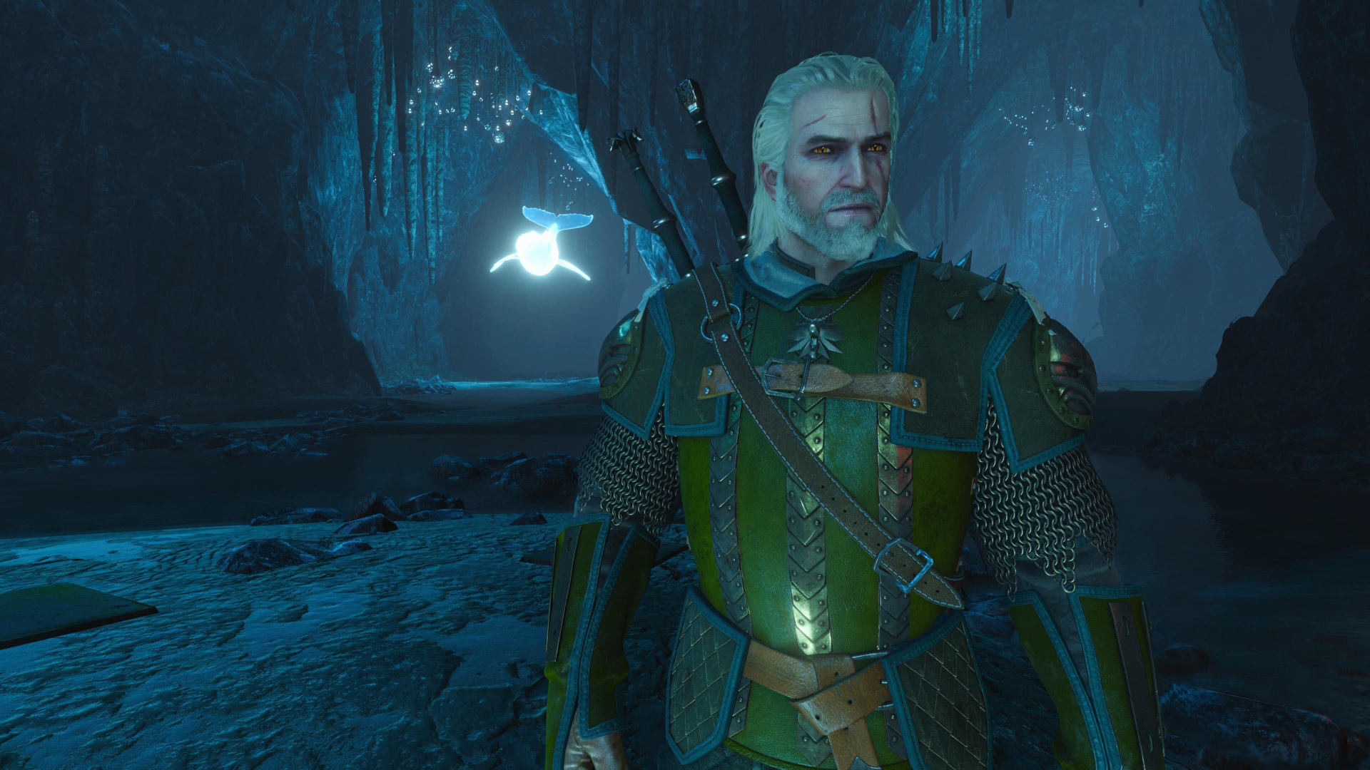 The Witcher 3 screenshot of Geralt in a cave wearing the Griffin armor set