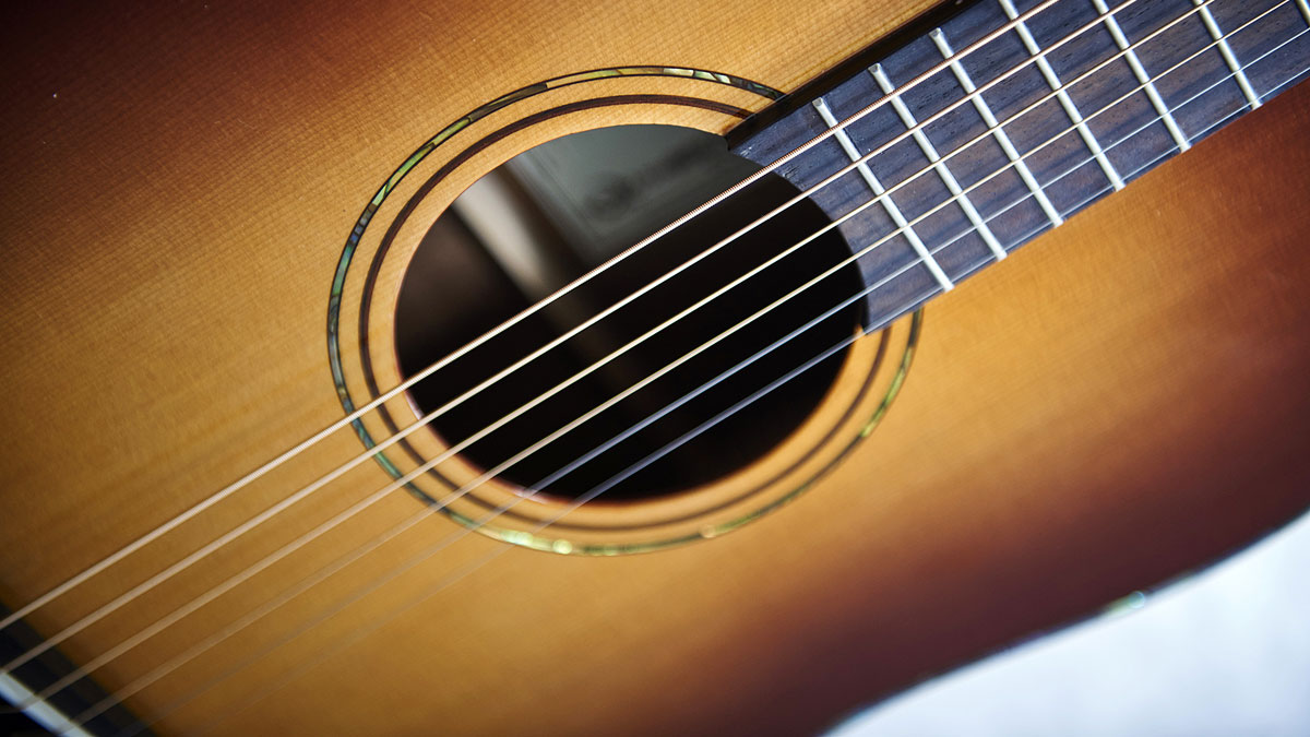 The solid Sitka spruce top has been given a caramel-hued Sunburst