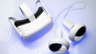 Oculus Quest 2 and its controllers on a white background with blue light illuminating the space