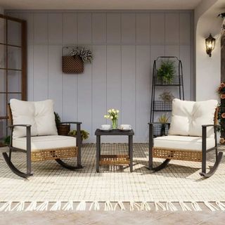 LAUSAINT Home Patio Conversation Set against a white wall. 