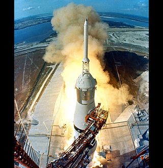 The swing arms of the launch tower move away, signaling the launch of the Apollo 11 mission to the moon on July 16, 1969.