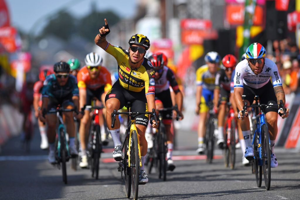 FLEURUS BELGIUM JULY 23 Dylan Groenewegen of Netherlands and Team Jumbo Visma celebrates at arrival ahead of Giacomo Nizzolo of Italy and Team Qhubeka Nexthash during the 42nd Tour de Wallonie 2021 Stage 4 206km stage from Neufchteau to Fleurus tourdewallonie grandprixdewallonie on July 23 2021 in Fleurus Belgium Photo by Luc ClaessenGetty Images