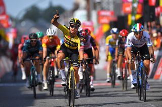 FLEURUS BELGIUM JULY 23 Dylan Groenewegen of Netherlands and Team Jumbo Visma celebrates at arrival ahead of Giacomo Nizzolo of Italy and Team Qhubeka Nexthash during the 42nd Tour de Wallonie 2021 Stage 4 206km stage from Neufchteau to Fleurus tourdewallonie grandprixdewallonie on July 23 2021 in Fleurus Belgium Photo by Luc ClaessenGetty Images