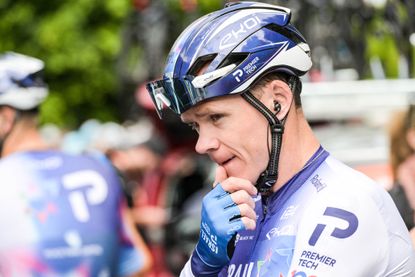 Chris Froome pensively stroking his chin