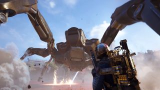 Arc Raiders Queen blaze grenade traps: A player reloading their gun while fighting a Queen at the base of the dam wall in Dam Battlegrounds, as it kicks up sand and fires a laser at another player in the distance.