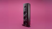 A Magico S7 (2026) floorstanding speaker on a pink background.