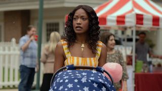 Samira (Keke Palmer) pushing a stroller in a scene from Peacock's "The 'Burbs"