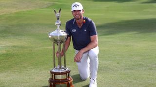 Sam Burns photographed with the trophy after his win in the 2022 Charles Schwab Challenge