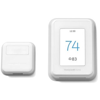 Honeywell T9 Smart Thermostat and remote room sensor on a white background