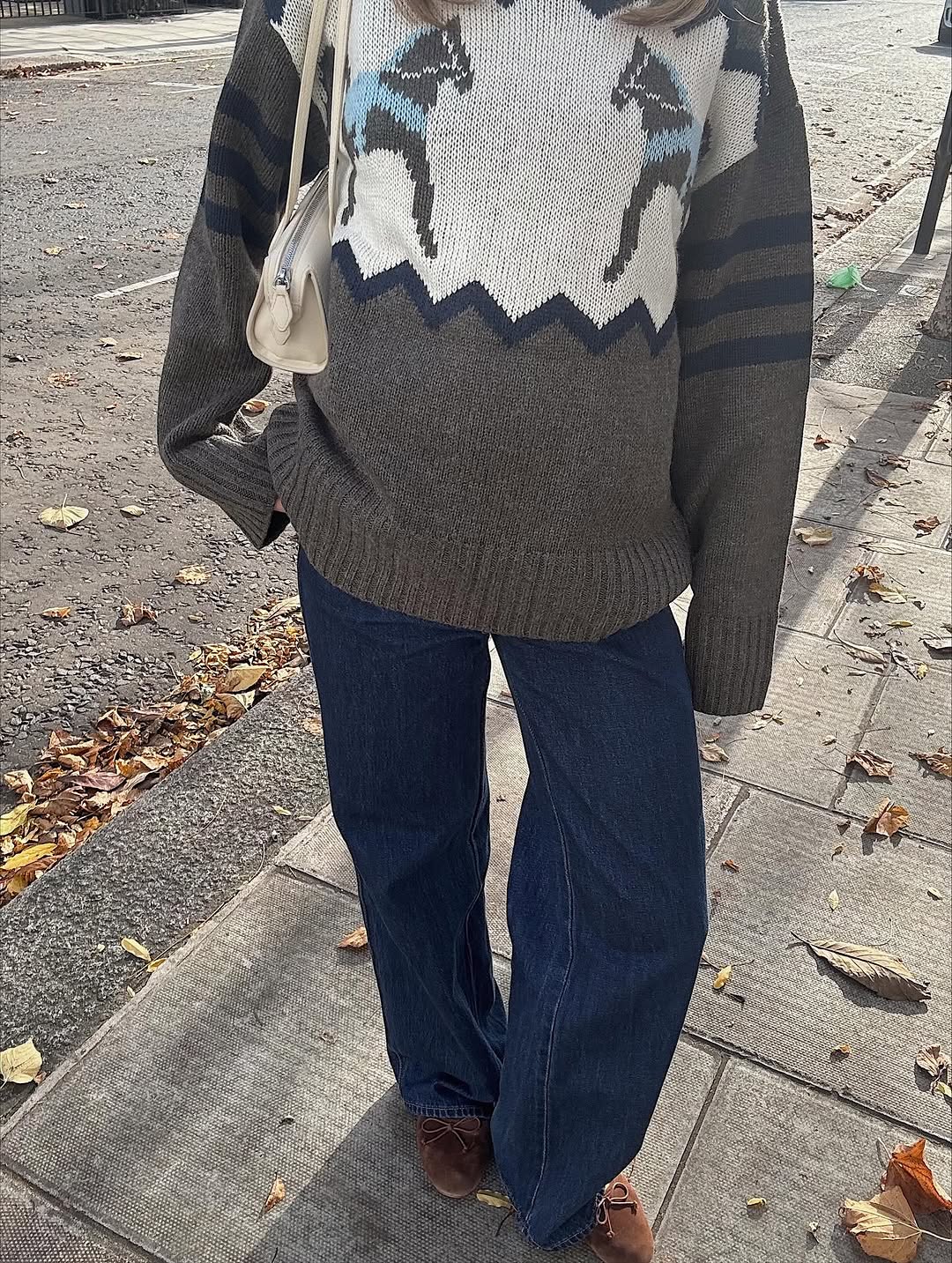 woman wearing winter denim outfit idea 2025