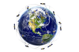 This animated images has the world in the centre with several satellites around it with a line showing their movement pattern