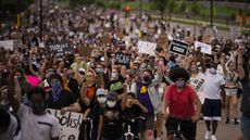 Protesters march on Hiawatha Avenue while decrying the killing of George Floyd on May 26, 2020 in Minneapolis, Minnesota.