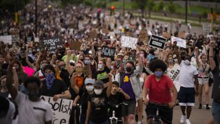 Protesters march on Hiawatha Avenue while decrying the killing of George Floyd on May 26, 2020 in Minneapolis, Minnesota.