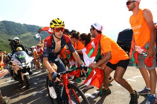 HAUTACAM FRANCE JULY 21 Adam Yates of United Kingdom and Team INEOS Grenadiers competes while fans cheer during the 109th Tour de France 2022 Stage 18 a 1432km stage from Lourdes to Hautacam 1520m TDF2022 WorldTour on July 21 2022 in Hautacam France Photo by Michael SteeleGetty Images