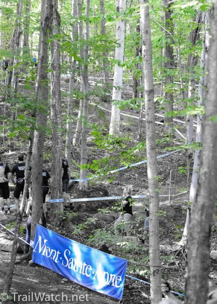 Downhill switchbacks through the trees