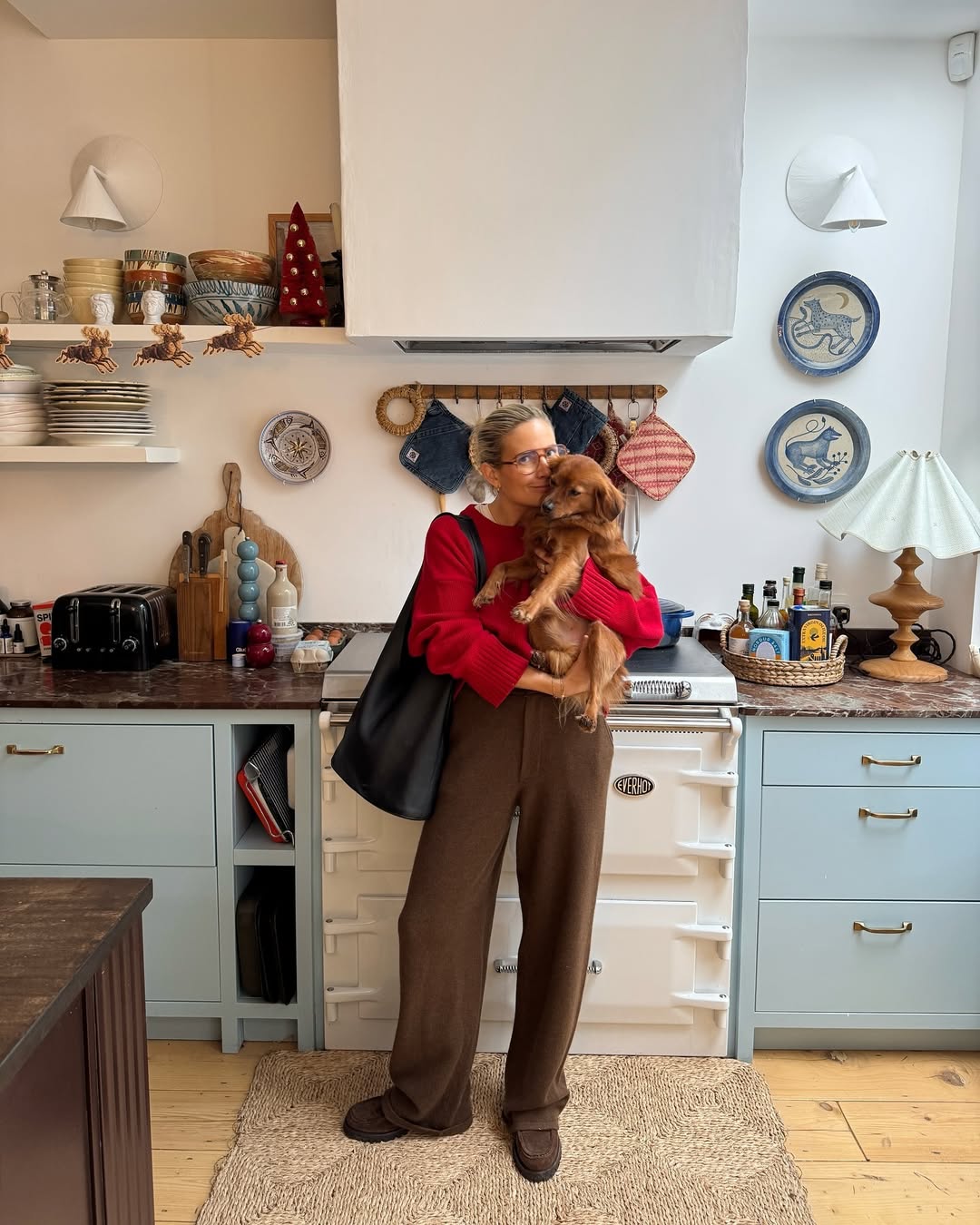 lucywilliams02 wears khaki trousers red jumper