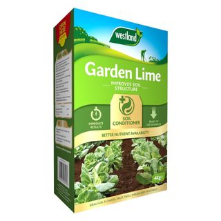 Green box of Westland garden lime with pictures of vegetables on the front and product info at the top