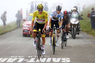 SAINTLARYSOULAN COL DU PORTET FRANCE JULY 14 Richard Carapaz of Ecuador and Team INEOS Grenadiers Tadej Pogaar of Slovenia and UAETeam Emirates Yellow Leader Jersey Jonas Vingegaard of Denmark and Team JumboVisma White Best Young Rider Jersey in the Breakaway at Col du Portet 2215m during the 108th Tour de France 2021 Stage 17 a 1784km stage from Muret to SaintLarySoulan Col du Portet 2215m LeTour TDF2021 on July 14 2021 in SaintLarySoulan Col du Portet France Photo by Tim de WaeleGetty Images