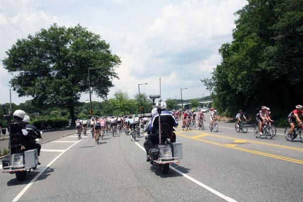 A unique moment on the streets of Philadelphia:: the men's and women's fields pass each other in opposite directions on Kelly Drive.