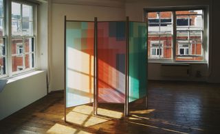 Folding screen with colourful pixelated design
