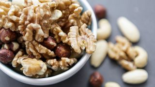 Bowl of walnuts, an essential part of the paleo diet