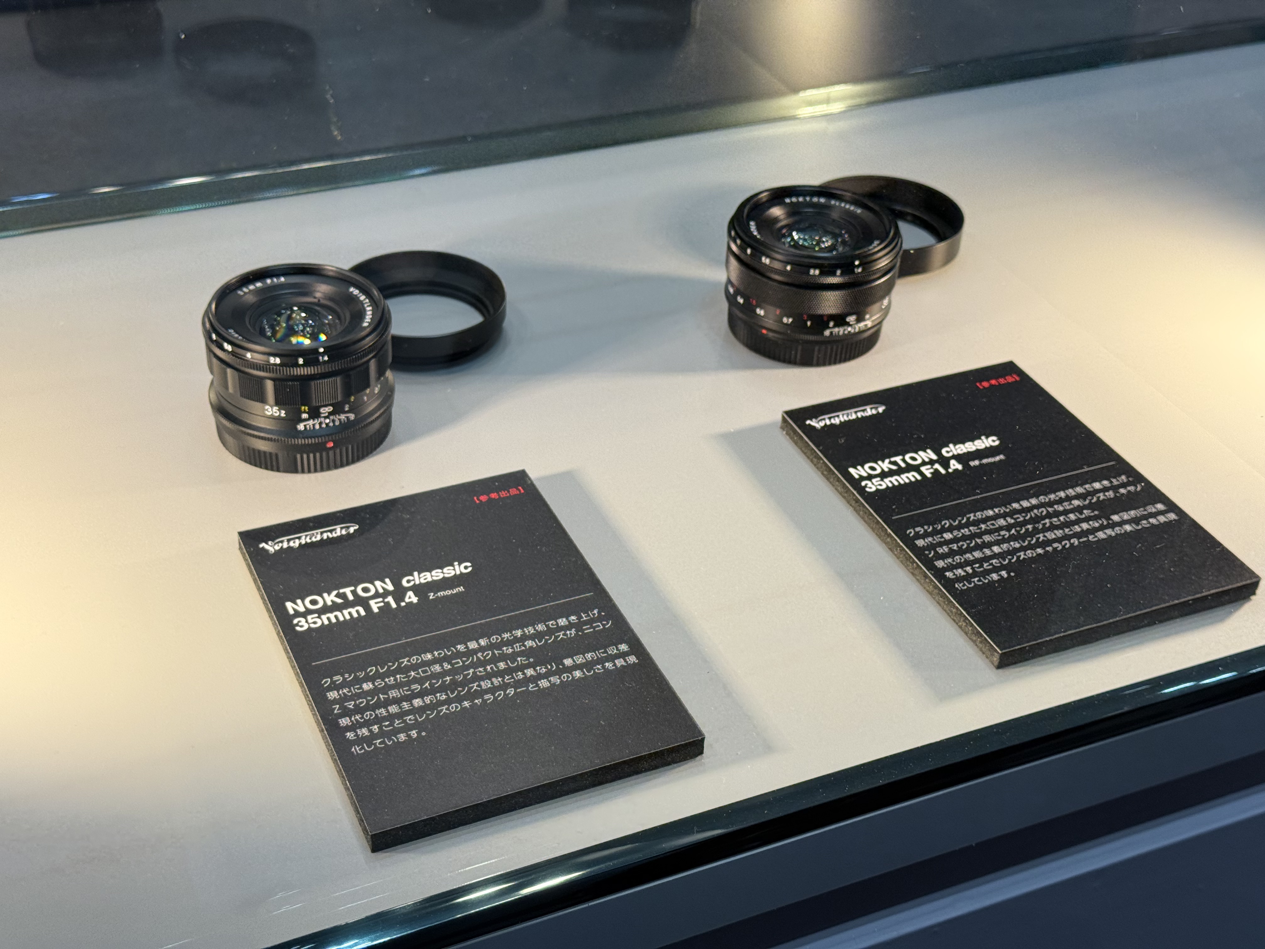 Two Voigtlander lenses on display at the CP+ 2026 show in Japan