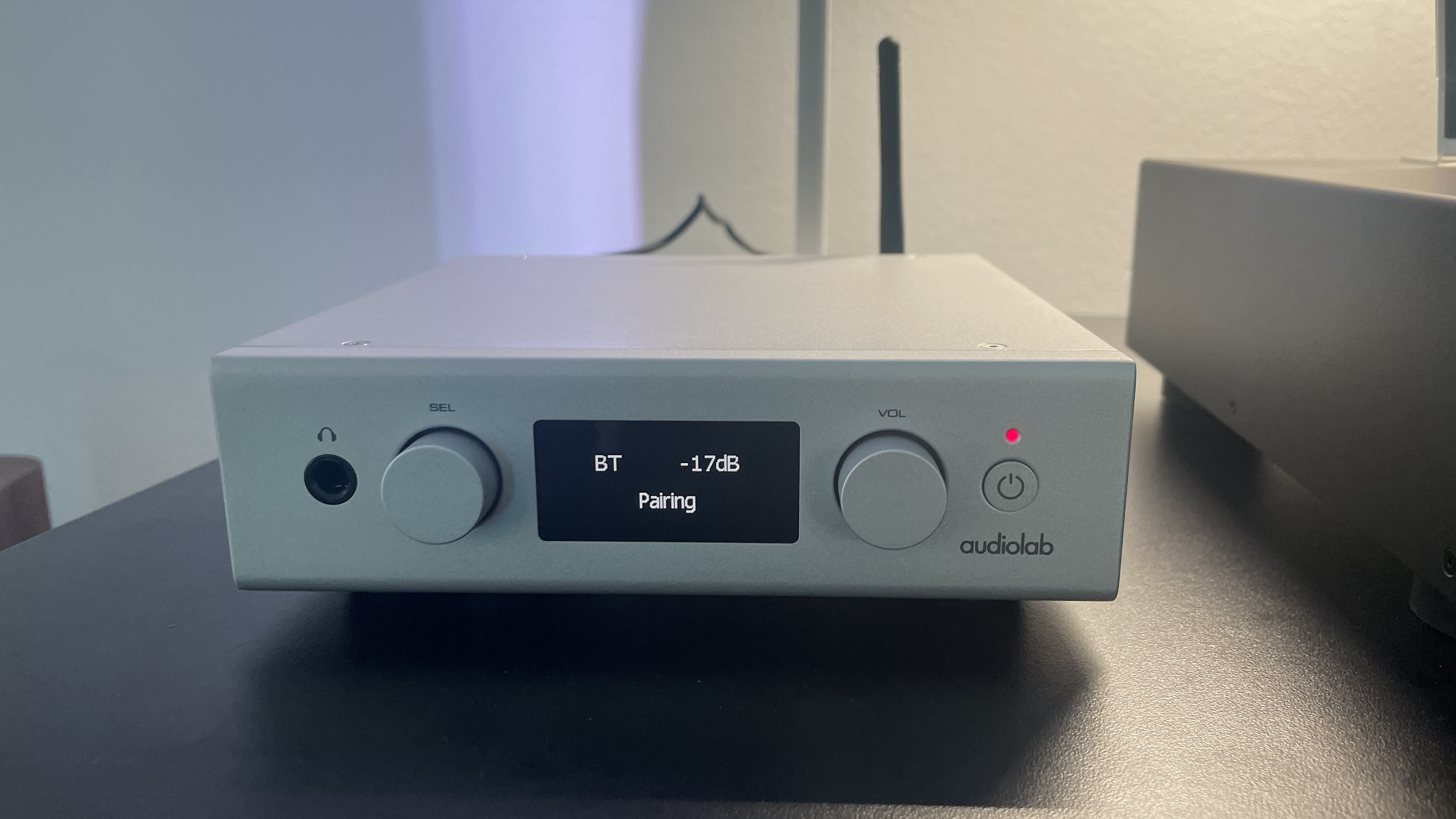 Audiolab D7 DAC on a black stand