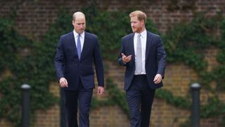 Prince William, Duke of Cambridge (left) and Prince Harry, Duke of Sussex arrive for the unveiling of a statue they commissioned of their mother Diana, Princess of Wales, in the Sunken Garden at Kensington Palace