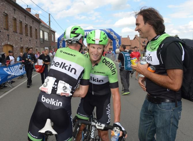 Stage 1 winner Mark Renshaw is congratulated by Belkin teammate Graeme Brown