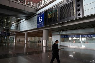 A nearly empty international arrivals area at Beijing airport on November 6, 2020.