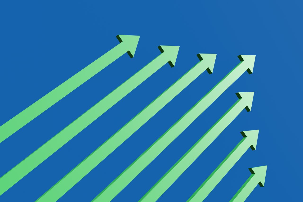 neon green arrows pointing up and to the right with blue background