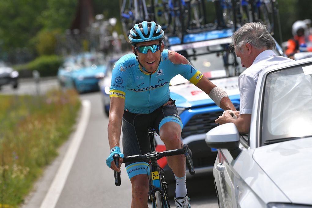 Omar Freaile receiving attention at the medical car after crashing during stage 4 at Tour de Suisse