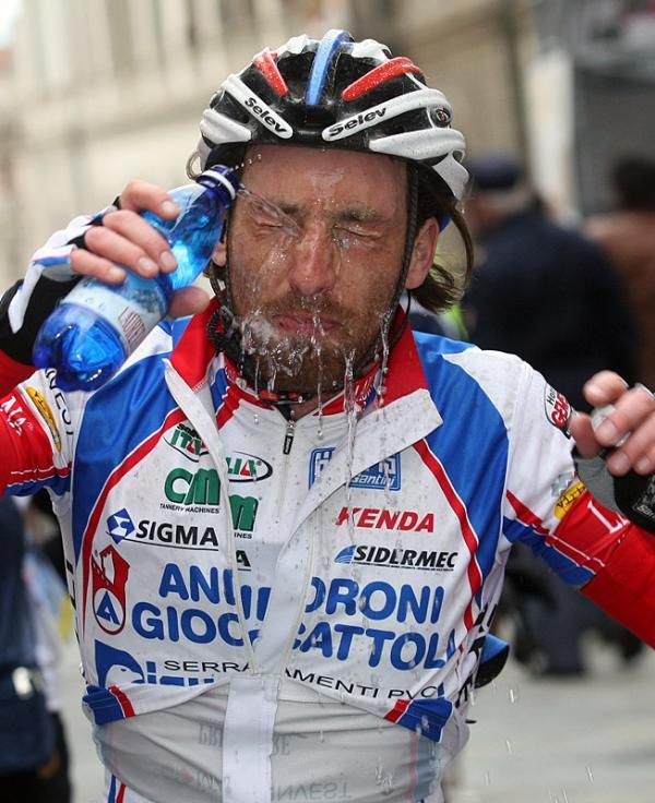 Francesco Ginanni (Androni Giocattoli) seeks relief at the finish.