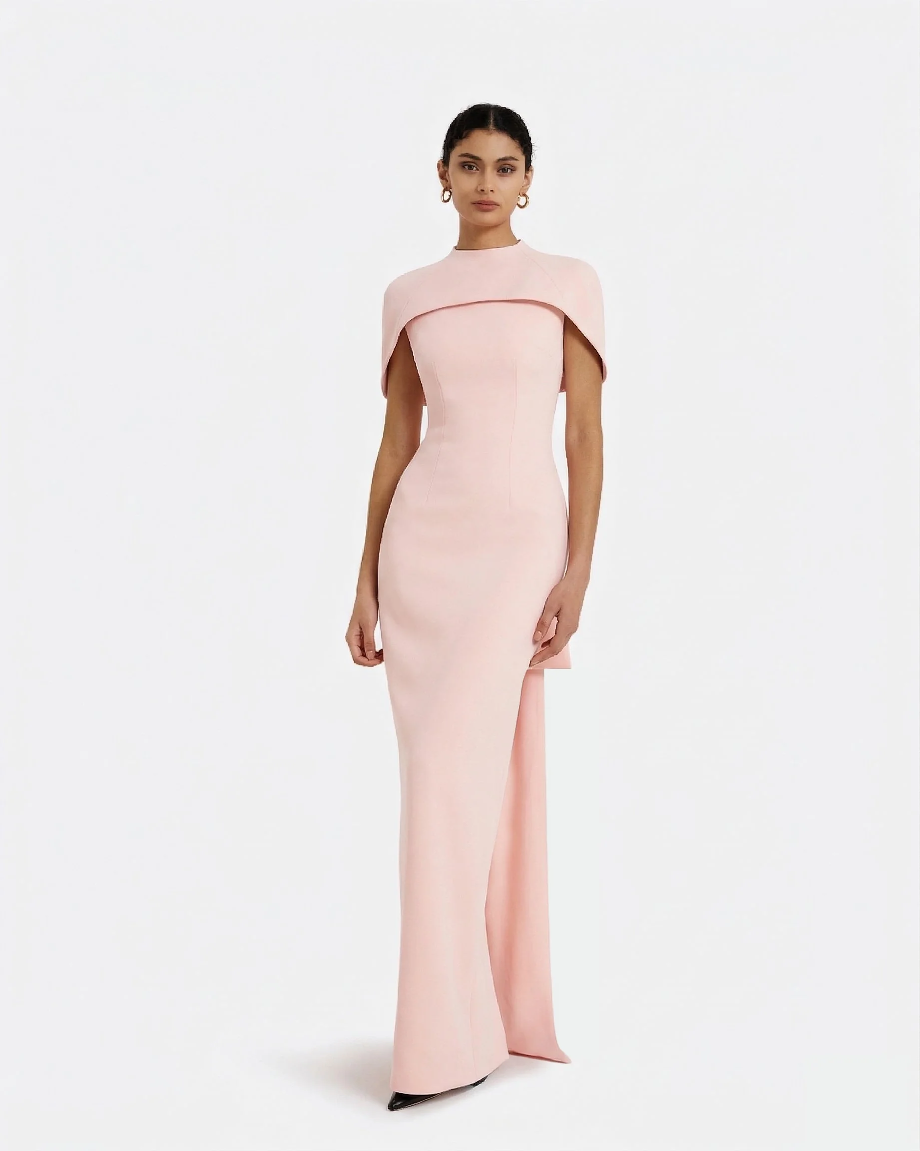 A model wearing a pink Safiyaa gown