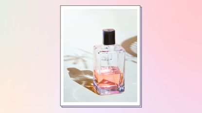 Glass bottle of perfume product, beauty product, cosmetic product on white background/ in a pastel gradient template