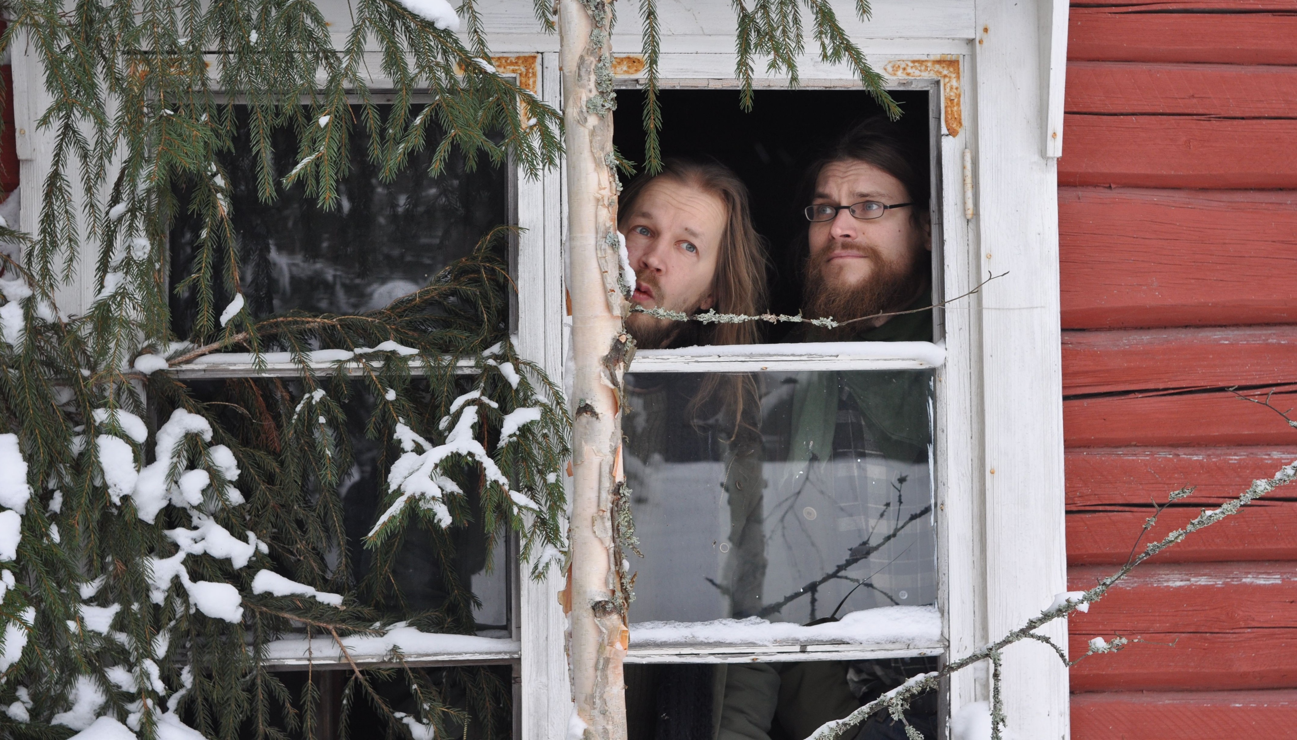 Sami and Erkka in a window