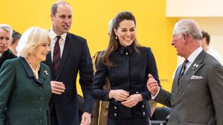 Prince William and Catherine, Princess of Wales talk with King Charles and Queen Camilla during their visit to the Defence Medical Rehabilitation Centre
