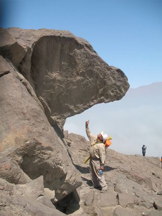 The El Paraíso condor lines up with this stone sculpted to resemble a condor head.