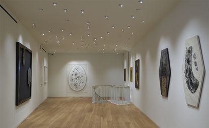 An exhibition space with artwork on display. 