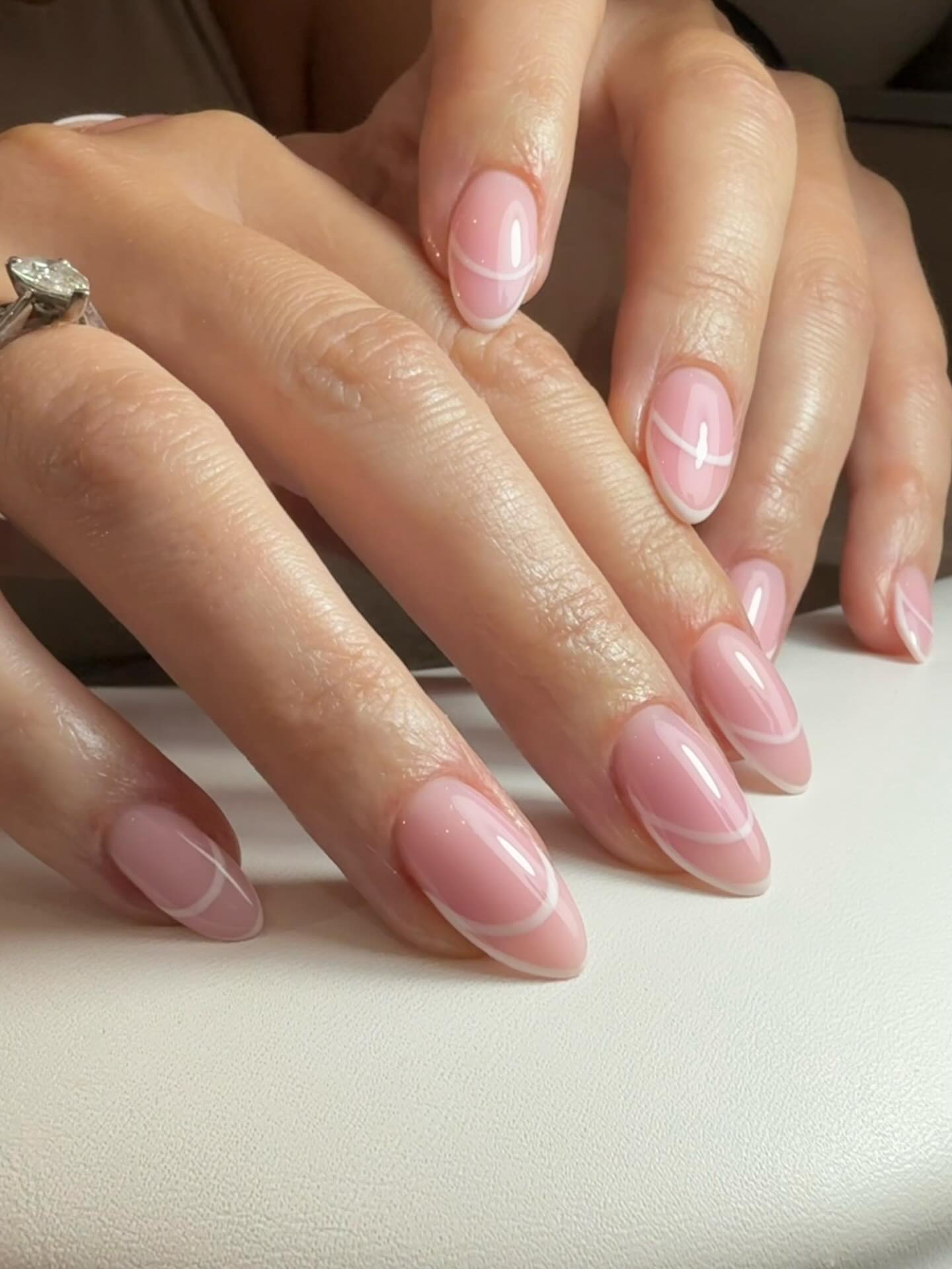 Negative space French manicure.